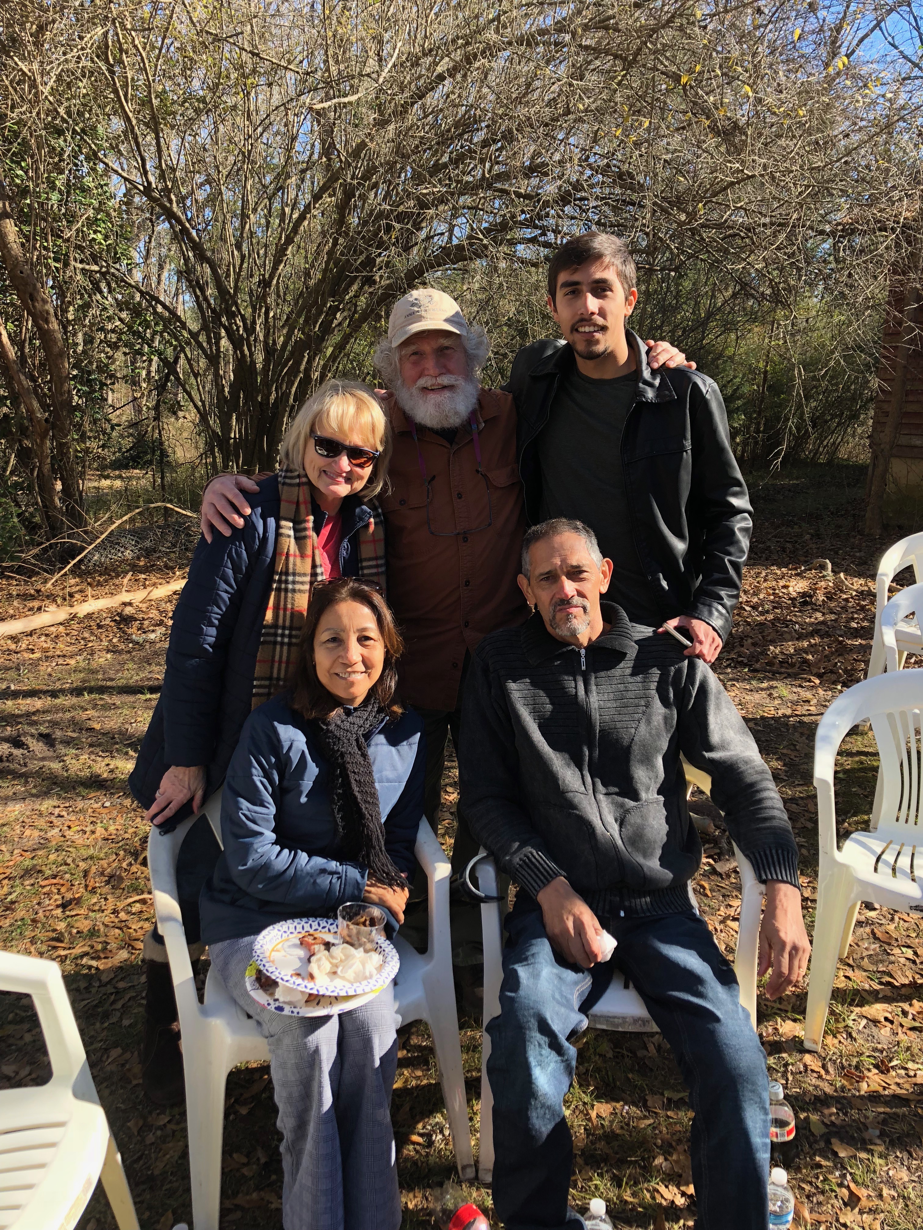 Brazillian GRSP student Gabriel Deller Aguiar, his father Natal and his mother Rose (front) enjoyed the holidays and cooked a traditional Brazilian dinner for RC of Griffin host family Anna and Skipper Burns