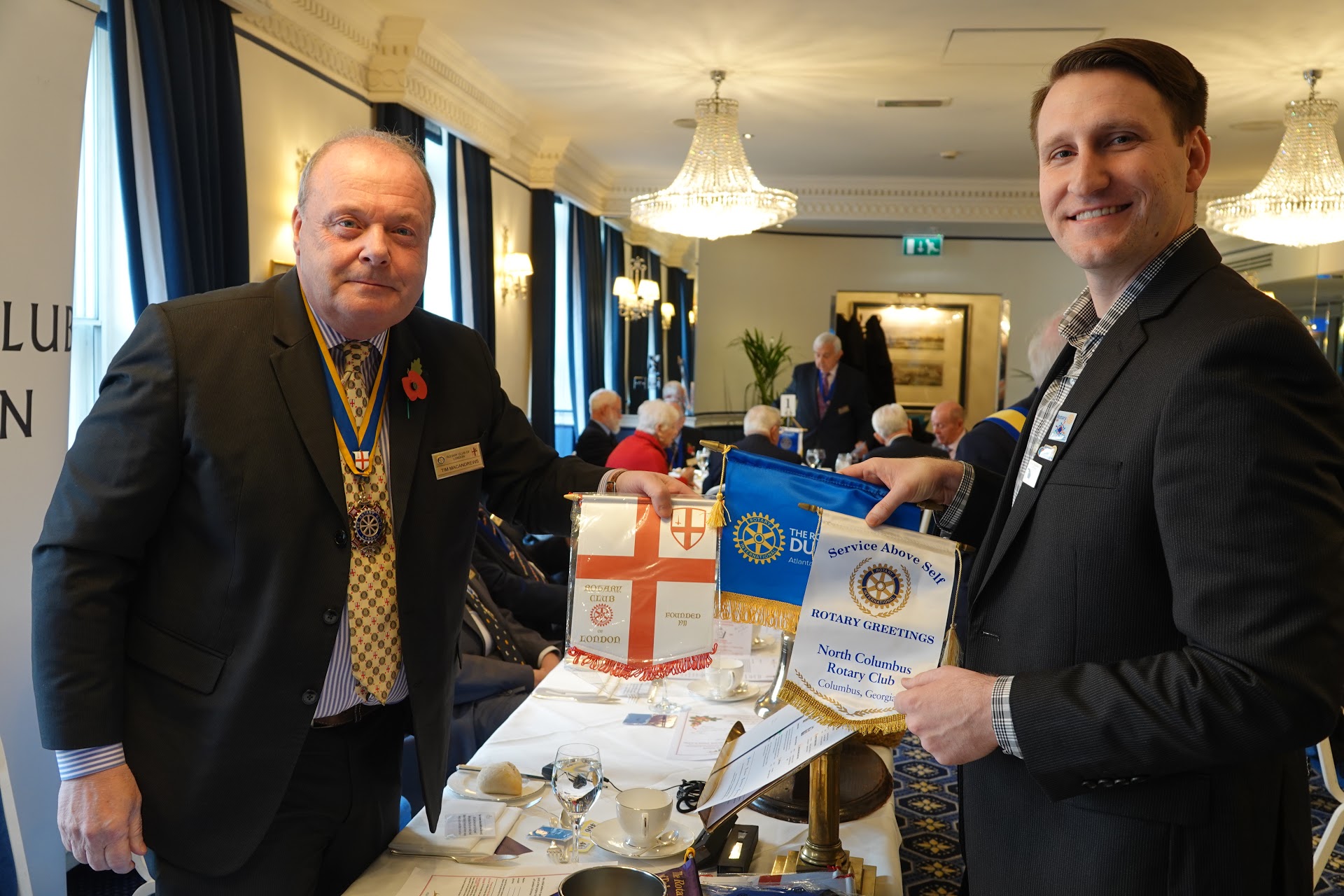 RCL President Tim Andrews and Sean exchange banners